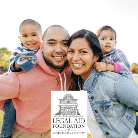A smiling family of four with the Legal Aid Foundation of Santa Barbara County logo below.