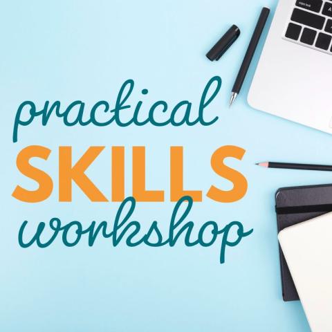 Black pen and pencil with a laptop and tablet against a blue background.