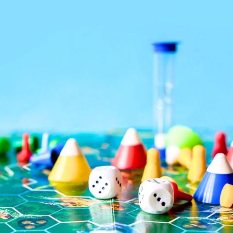 Illustration of variety of board game pieces